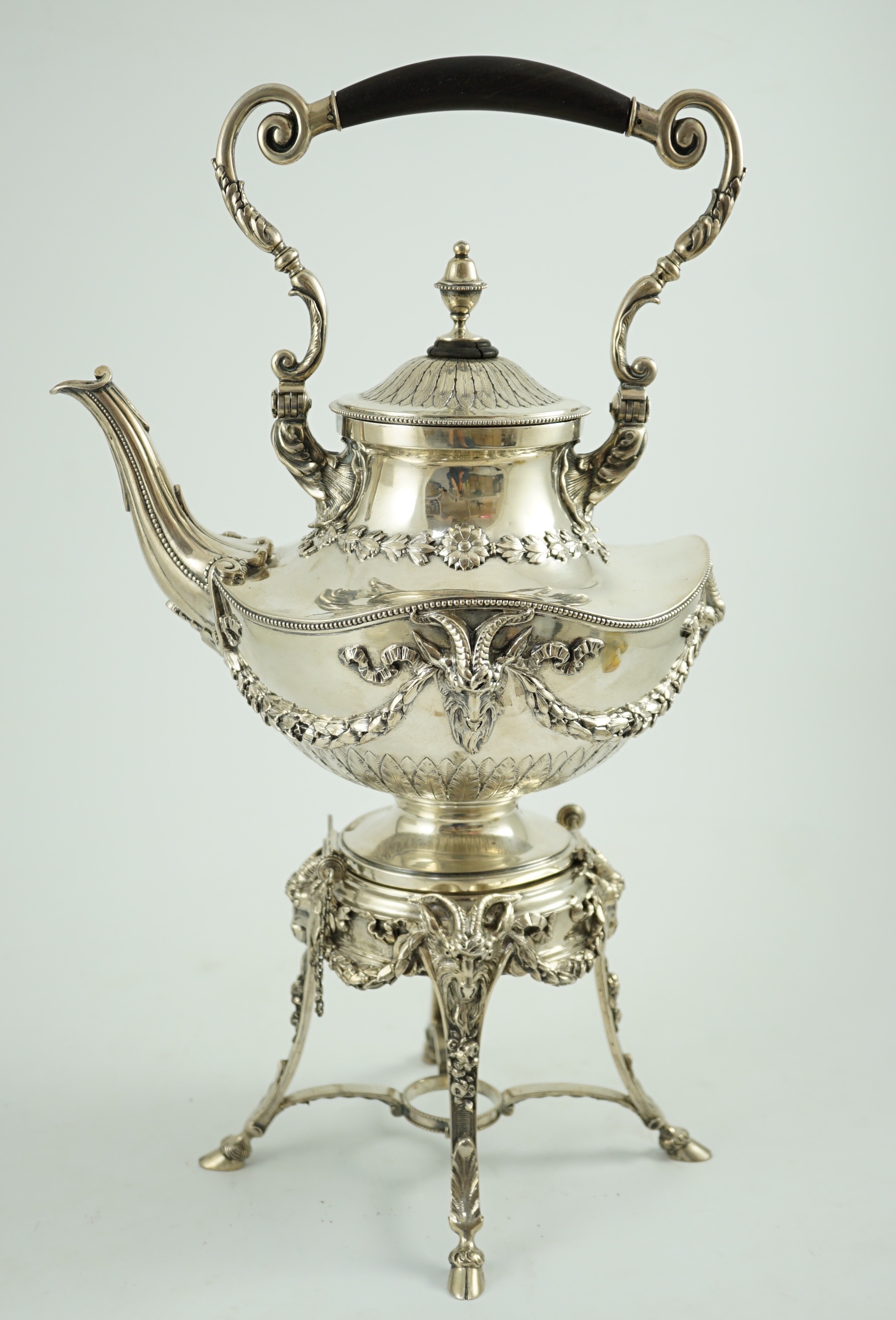 An ornate late 19th/early 20th century Austro-Hungarian 800 standard silver tea kettle on stand